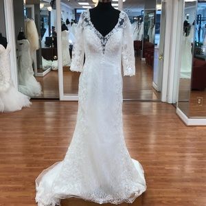 Ivory wedding gown with lace floral print